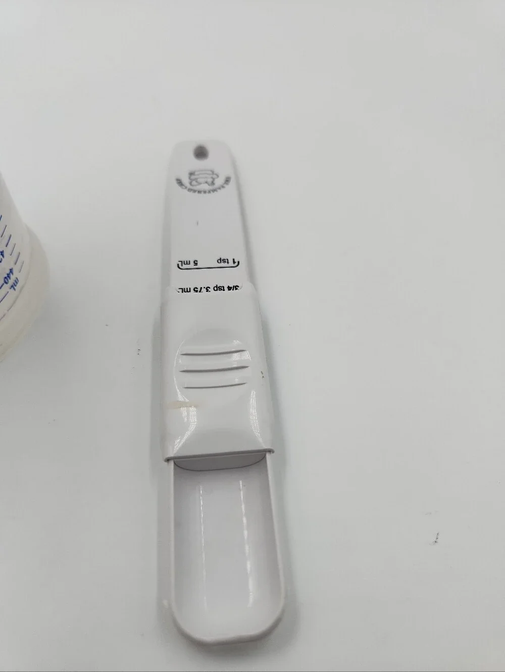 Pampered Measure All Measuring Cup for Dry Solids And adjustable Teaspoon